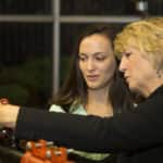 Susan Schierwagen, Victaulic Vice President for Coupling & Fire Suppression Systems, working with female engineering student