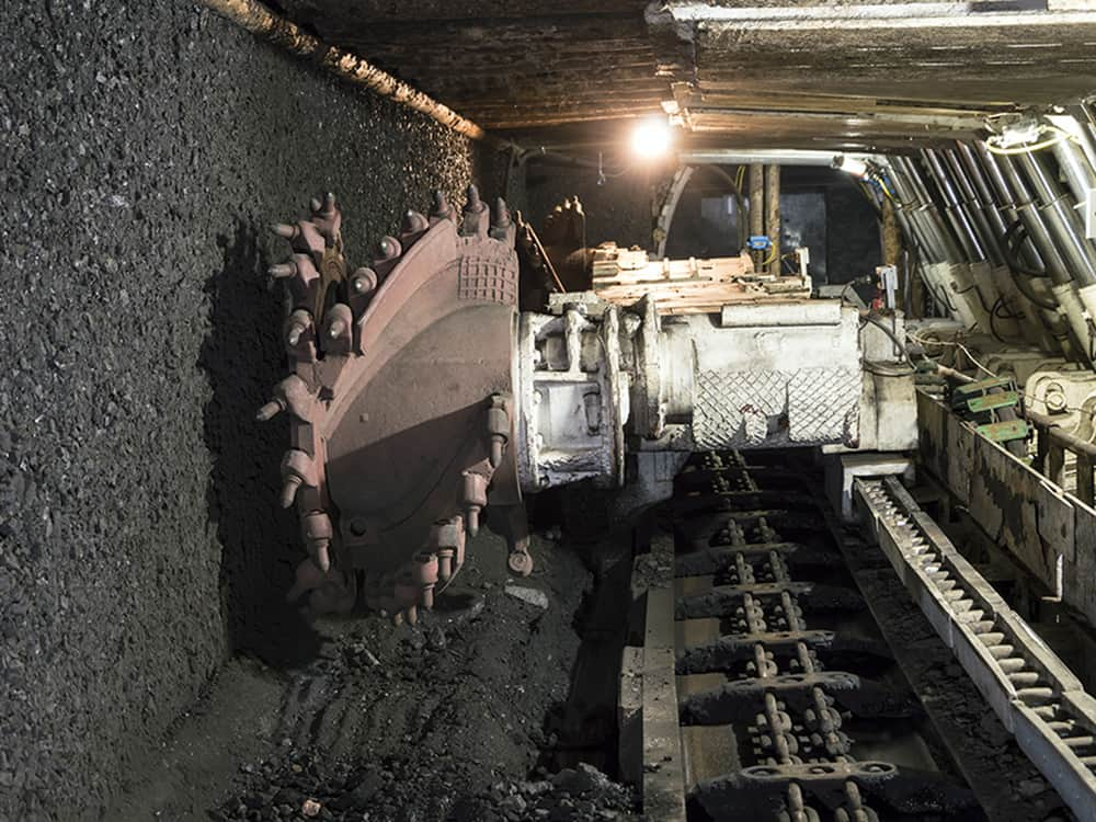 Mine excavator facing coal wall