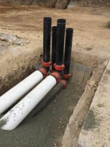 buried insulated and non-insulated heating and cooling water distribution piping joined with Victaulic style 905 couplings for hdpe pipe.