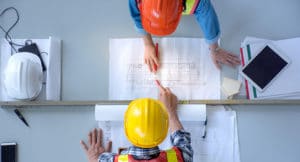 Top view of group of engineering team is meeting, planning const