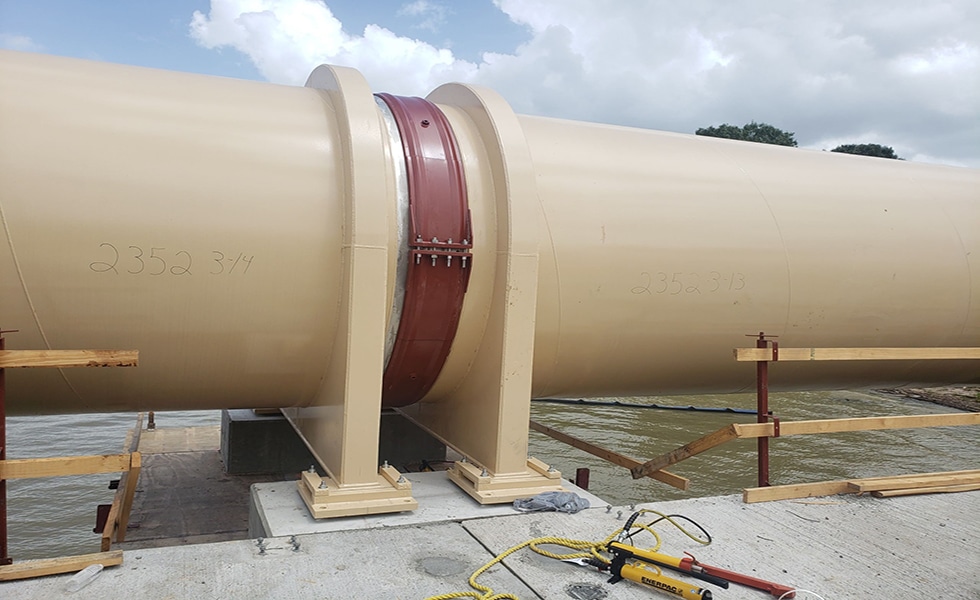 Large diameter carbon steel pipe joined by Victaulic Style 232 Restrained Flexible Coupling