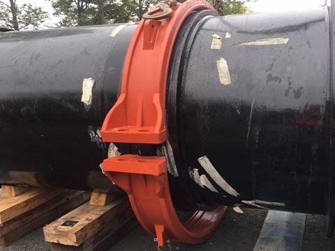 A pipe section and Victaulic AGS Flexible Coupling awaiting install